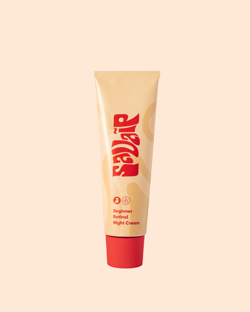Beige tube of Savaip Beginner Retinol Night Cream with red cap on a light background.